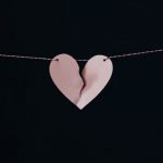 Image of a pink paper heart on a string